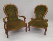 A pair of Victorian his and her's button upholstered spoon back salon chairs.