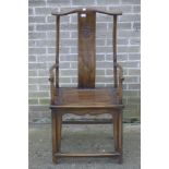 A late 19th/early 20th century Chinese elm splat back arm chair. 59 cm wide.