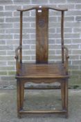 A late 19th/early 20th century Chinese elm splat back arm chair. 59 cm wide.