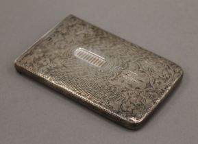 A silver card case. 5.5 cm wide. 63.4 grammes.