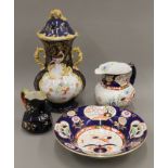 A Masons ironstone jug and bowl, another jug and a potpourri vase. The latter 39 cm high.