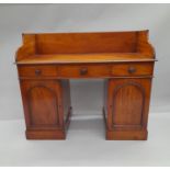 A Victorian mahogany wash stand. 107 cm wide.