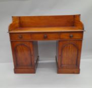 A Victorian mahogany wash stand. 107 cm wide.
