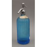 A vintage Greene King blue glass soda syphon. 30 cm high.