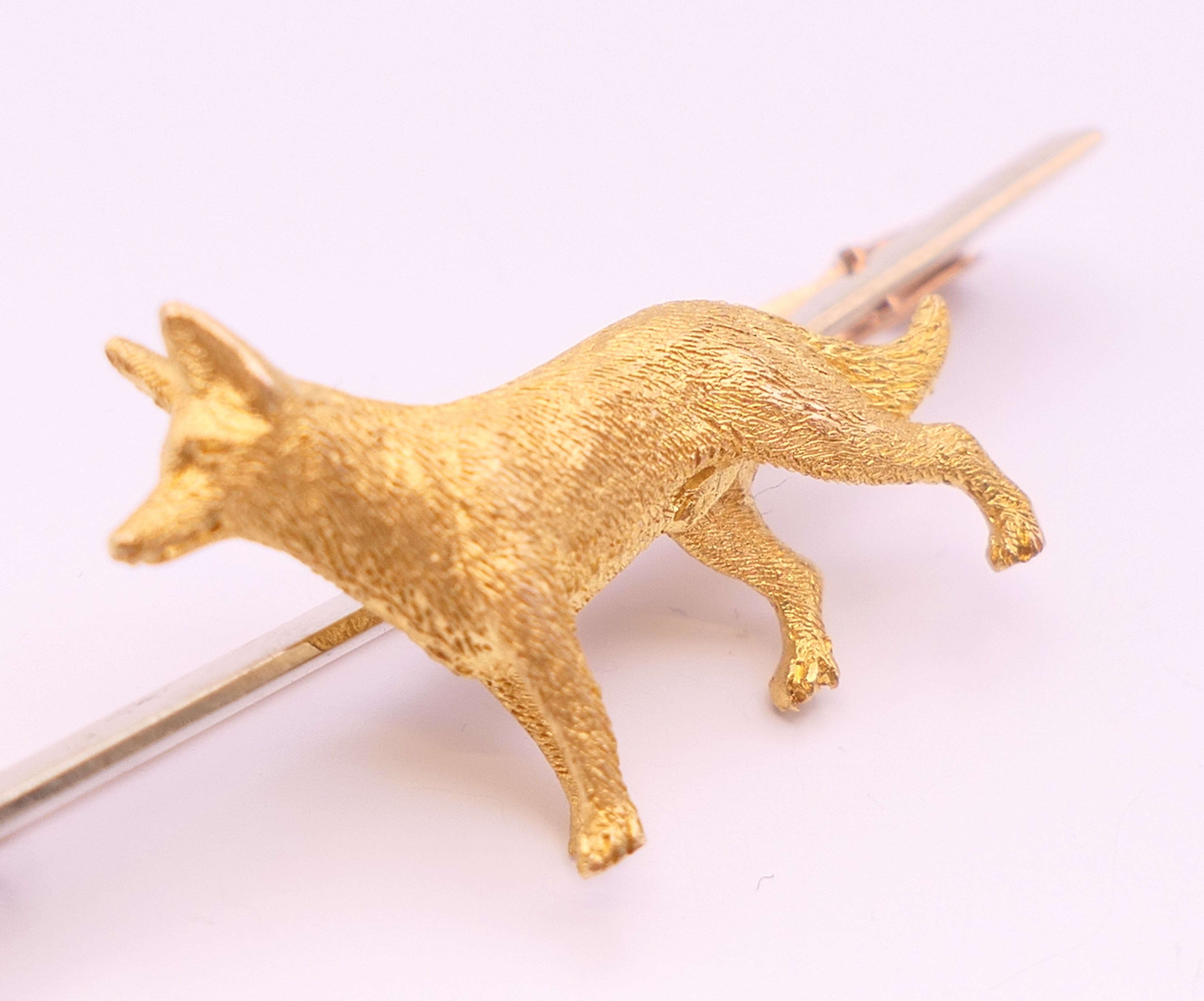 A 9 ct gold bar brooch, set with an unmarked 15 ct gold Alsatian. 5 cm long, dog 2.25 cm long. 7. - Image 8 of 9