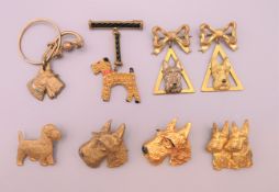 Eight 1930s gilt metal Scottie dog form brooches. Double Scottie dog brooch 3.5 cm high.