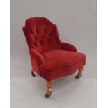 A Victorian red velvet upholstered nursing chair. 58 cm wide.