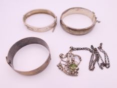 A small quantity of silver jewellery, including bangles. 88.4 grammes total weight.