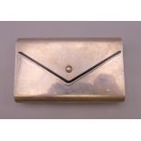 A Cartier sterling silver envelope purse. 10 cm wide. 147.2 grammes total weight.