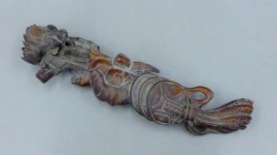 A model of a ruyi sceptre. 42 cm long.