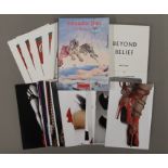 A quantity of various Salvador Dali and Damien Hirst postcards, etc.