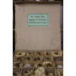 A box of early 20th century light bulbs.