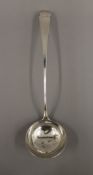 A Georgian silver ladle. 34 cm long. 165.2 grammes.