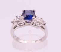 A platinum sapphire and diamond ring,
