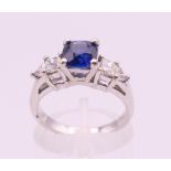 A platinum sapphire and diamond ring,