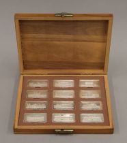 A boxed set of 12 Royal Palaces silver ingots. Each 31.3 grammes.
