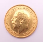A 1913 gold half sovereign.