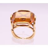 A gold and topaz or citrine ring. Ring size N/O.