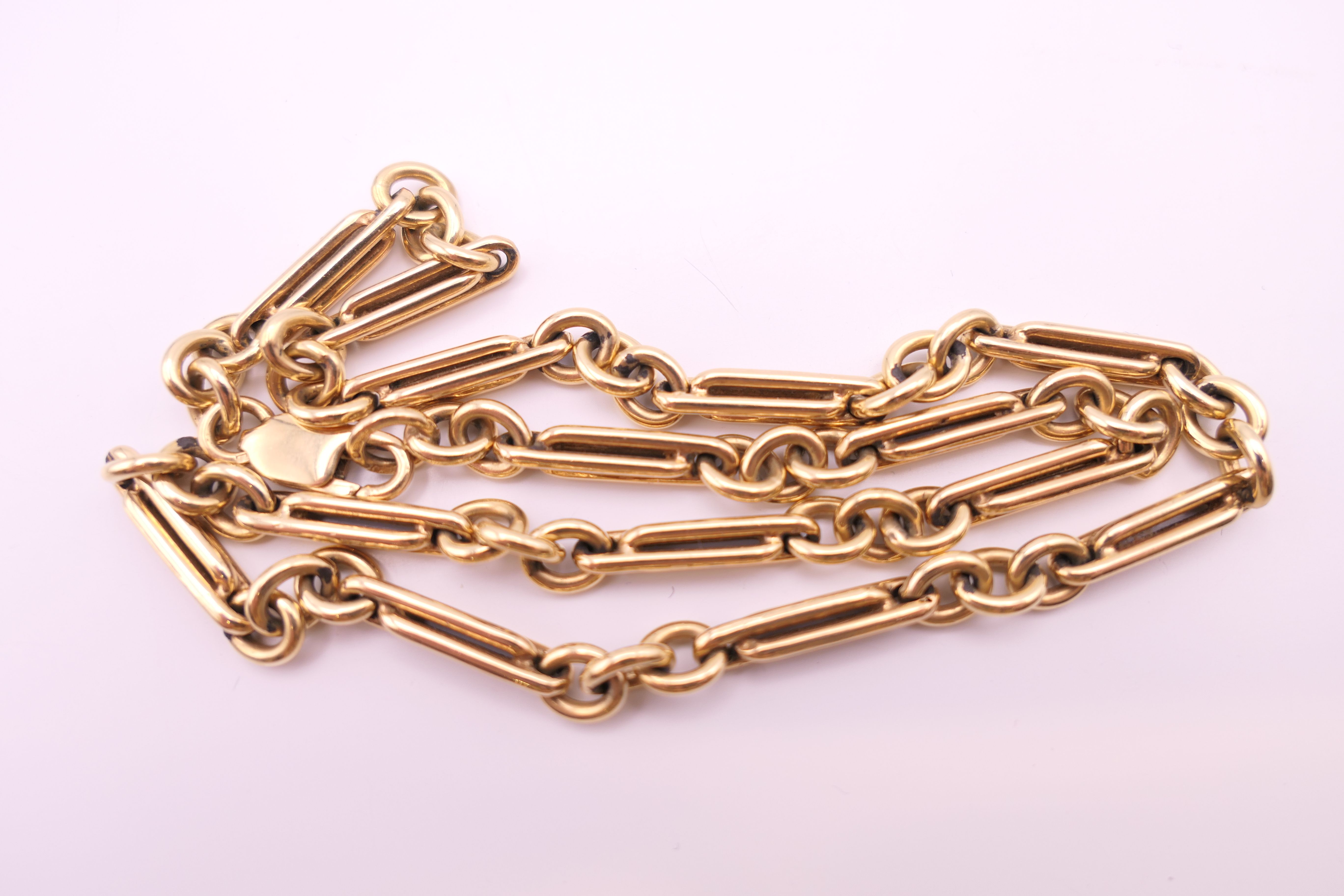 A 9 ct gold watch chain, converted to a necklace. 40.5 cm long. 29.9 grammes. - Image 3 of 5