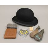 A quantity of miscellaneous items, including a bowler hat, a cigar case, an AA badge, etc.