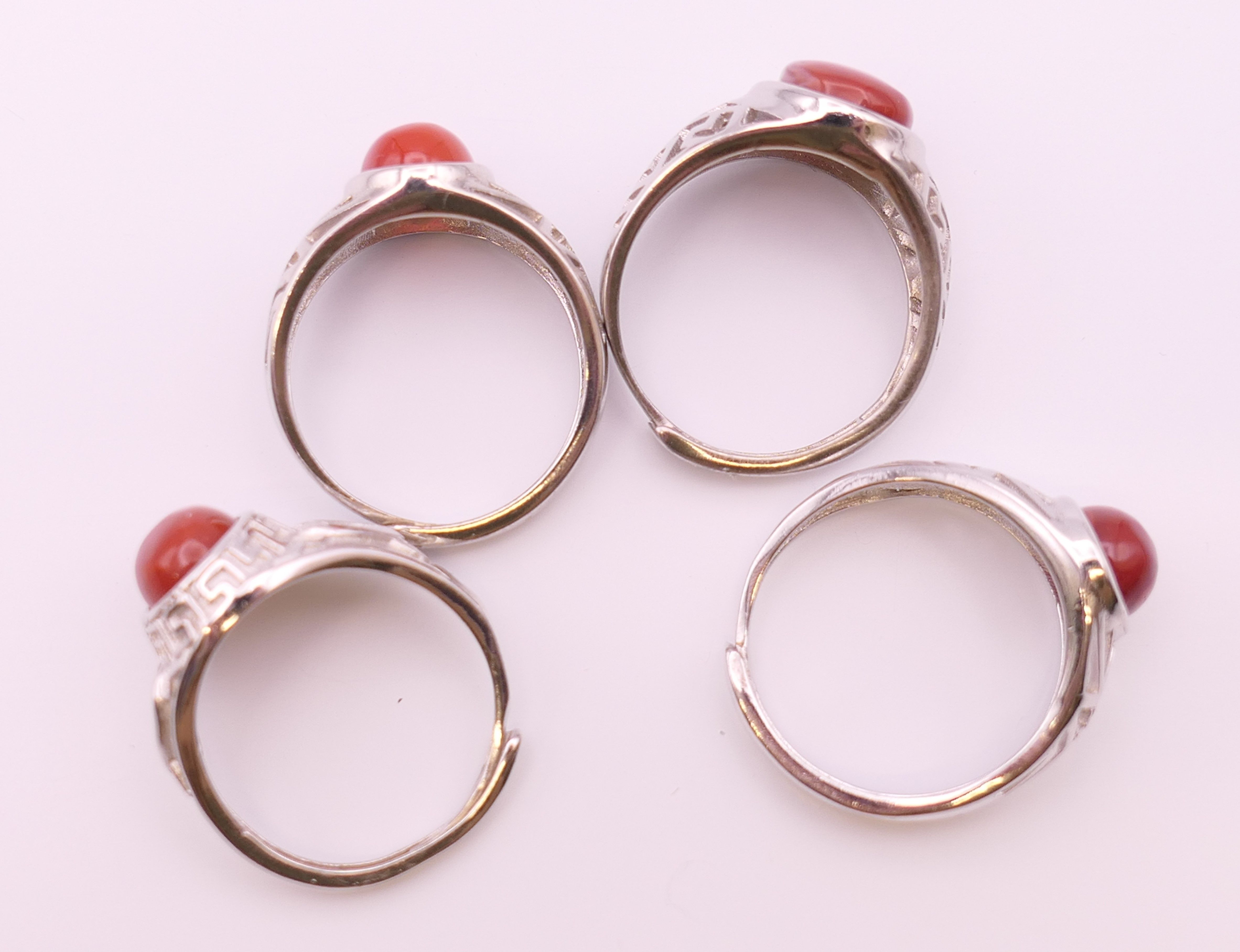 Four silver and coral rings. - Image 4 of 4