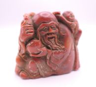 A Chinese soapstone seal. 6 cm high.