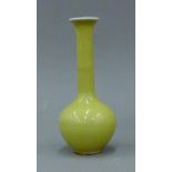 A Chinese yellow porcelain vase. 17 cm high.