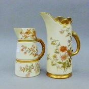 Two Royal Worcester jugs. The largest 21 cm high.