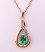 A 9 ct gold pendant on chain. Pendant 3 cm high including suspension loop, chain 44 cm long. 3.