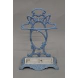 An Art Nouveau blue painted stick stand and a blue coal scuttle. The former 60 cm high.