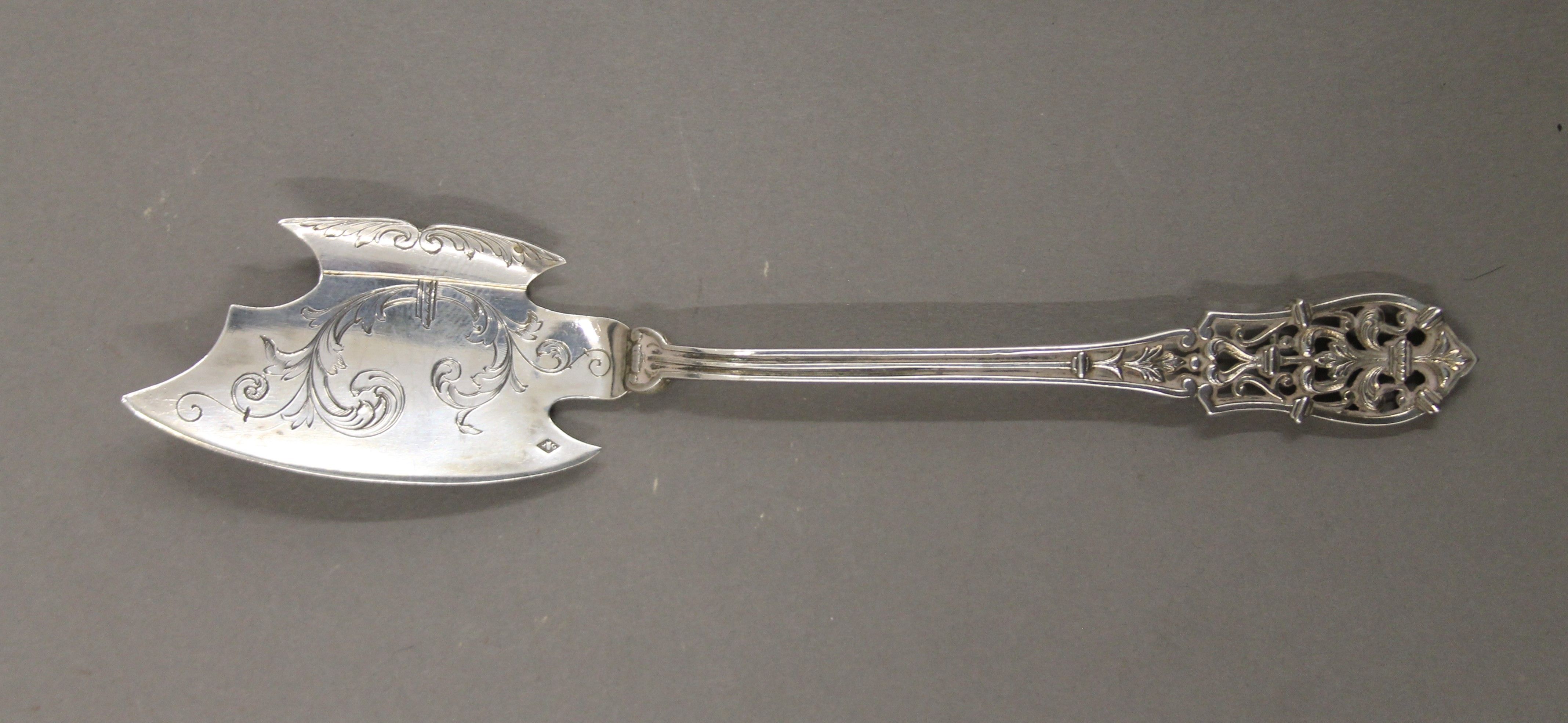 A set of four Continental pierced silver patisserie servers and eaters. The largest 17 cm long. 100. - Image 2 of 4