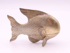 A Chinese silver plated fish form box. 8.5 cm long.