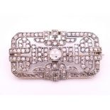 A 19th century pierced open work canted rectangular diamond set brooch,