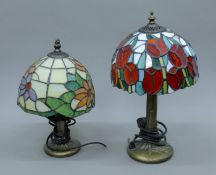 Two Tiffany style lamps. The largest 37 cm high.