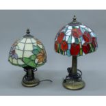 Two Tiffany style lamps. The largest 37 cm high.