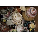 A box of various decorative ceramics.
