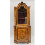A late 18th/early 19th century Dutch marquetry corner cabinet. Approximately 197 cm wide.