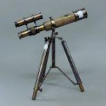 A small telescope on stand.