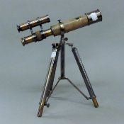 A small telescope on stand.