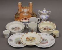 A quantity of Bunnykins, Beatrix Potter porcelain and a Staffordshire Trinity College flat back.