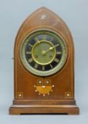 A Victorian inlaid mahogany mantle clock. 35 cm high.