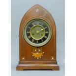 A Victorian inlaid mahogany mantle clock. 35 cm high.