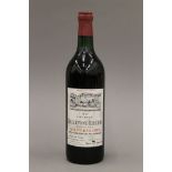 A bottle of 1967 Chateau Bellefont-Belcier Grand Cru Saint Emilion. 28 cm high.