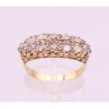 An 18 ct gold and diamond navette ring. Total diamond weight approximately 1.3 carats. Ring size O..