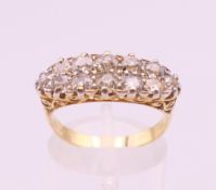 An 18 ct gold and diamond navette ring. Total diamond weight approximately 1.3 carats. Ring size O..
