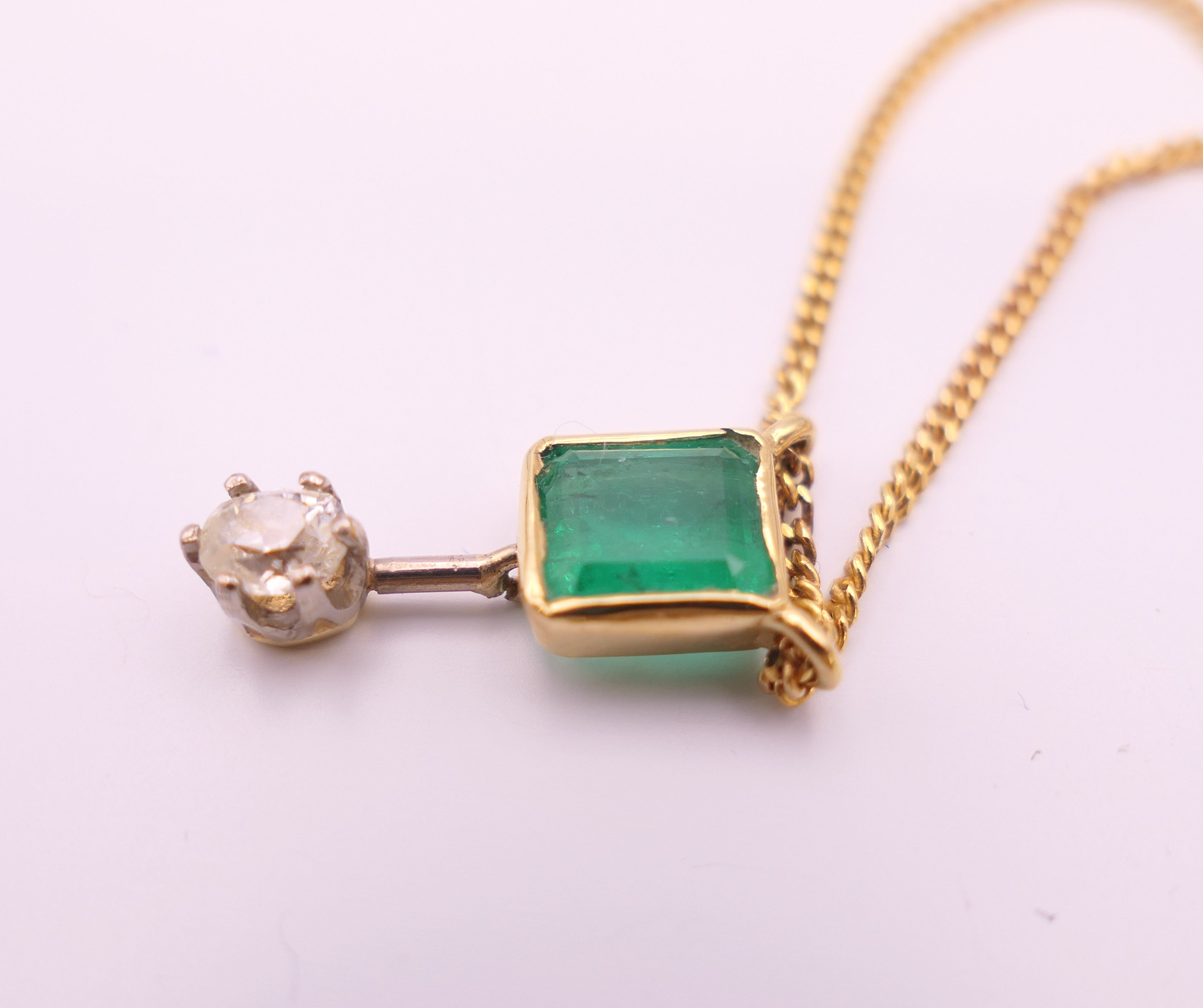 A 9 ct gold, emerald and diamond pendant necklace with matching earrings. Pendant 1. - Image 6 of 8