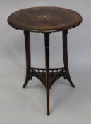 A Victorian inlaid rosewood occasional table. Approximately 50 cm diameter.