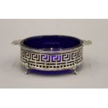 A Walker & Hall silver dish with blue glass liner, hallmarked Sheffield 1915. 11 cm wide. 58.