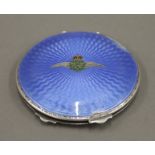 An enamel decorated RAF silver compact. 7 cm diameter. 63.4 grammes total weight.