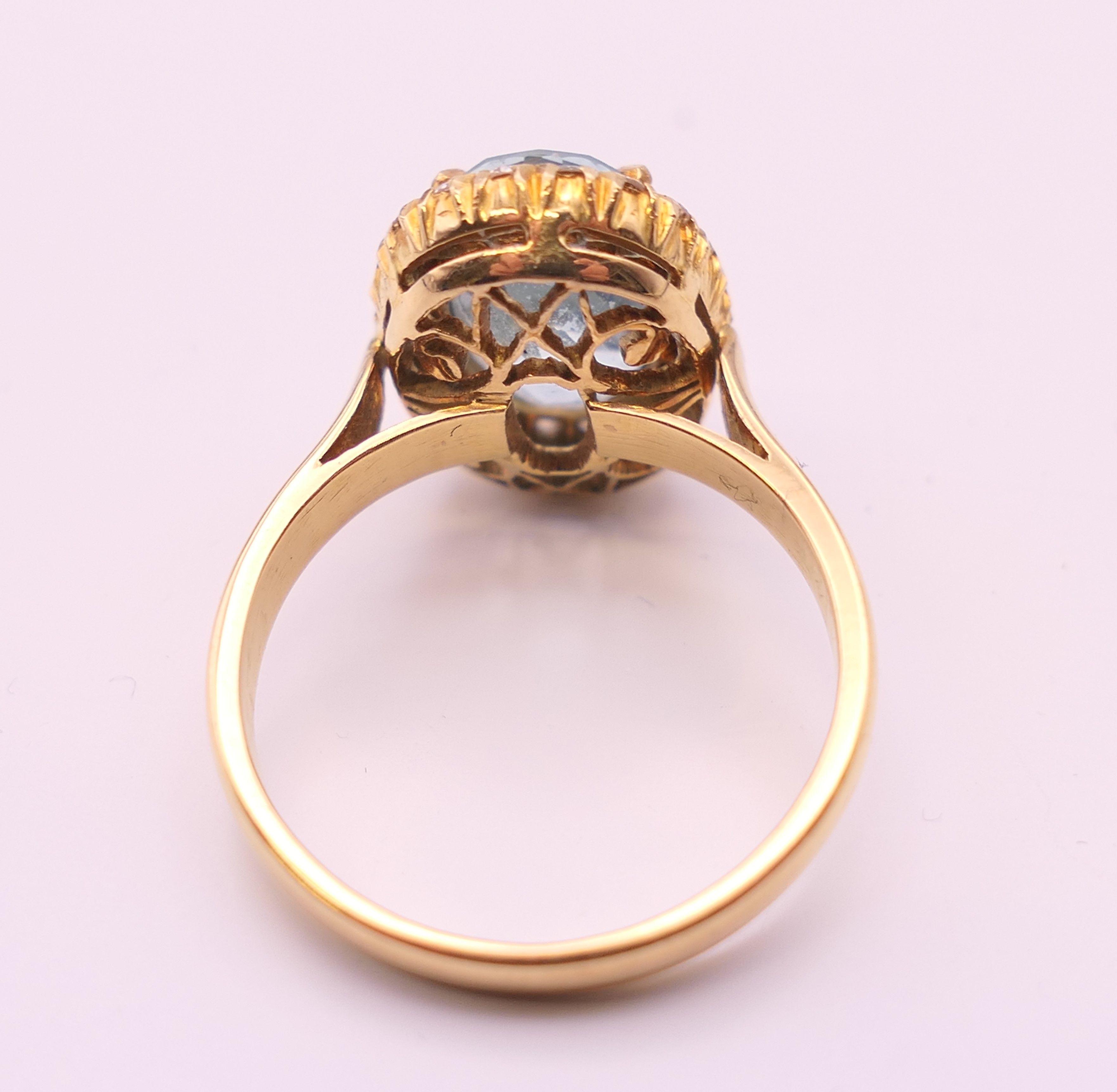 An 18 ct gold diamond and aquamarine ring. Ring size M/N. - Image 6 of 8